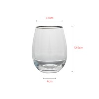 Mouth-blown clear crystal tumbler with elegant gold rim