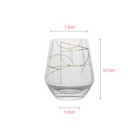 Mouth-blown clear crystal tumbler with customized gold pattern