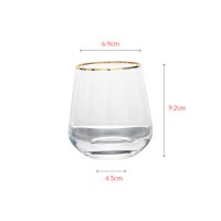 Mouth-blown clear crystal tumbler with gold rim painting