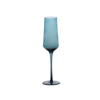 Luxury crystal champagne glass with vibrant blue color